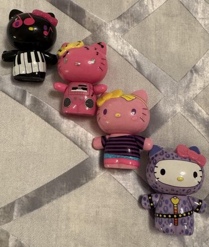 Hello kitty figures with - hello,