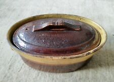 Terrine ovale ancienne en terre cuite vernissée patinée