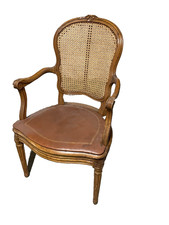 Fauteuil canné en bois à
