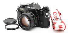 [ COMME NEUF ] Appareil photo argentique noir Canon AE-1 PROGRAM NFD 50mm f/1...