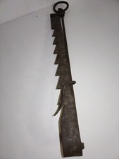 Ancienne crémaillère feu à l'âtre cheminée