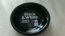Cendrier vide poche publicitaire black & white scotch whisky
