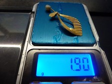 pendentif or 18 KTS et perle,P 1,90g,H 35mm,tete d'aigle