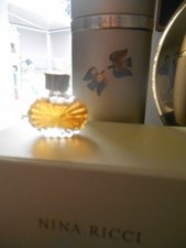 RARE Miniature ancienne" SOLEIL RAYONNANT  de Nina RICCI -PLEINE  sans boite 