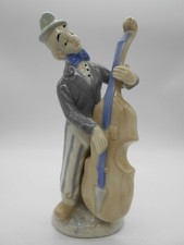 GRANDE FIGURINE CLOWN A LA CONTREBASSE EN PORCELAINE ALLEMANDE ? 