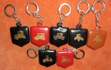 Porte-clés lot 7 Biscuits Alsacienne TACOTS 1900 sur écusson ( 1 en double )