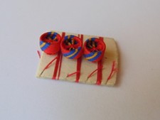 3 ROSETTES SUR FIL ORDRE