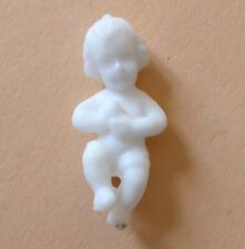 Fève du Mexique en plastique ou Muneco - Un Enfant