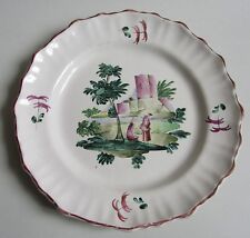 Varages. Assiette en faïence à décor d'un couple dans un paysage, XVIIIe siècle