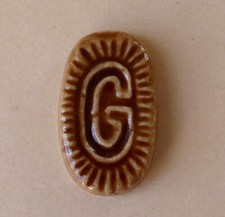 Fève des années 1990 de Maurin - Ovale " G "