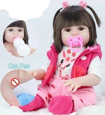 Poupee REBORN 46 cm boit son biberon FAIT PIPI realiste..couches..set de repas..