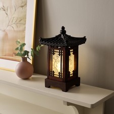 Lampe en bois sculpté
