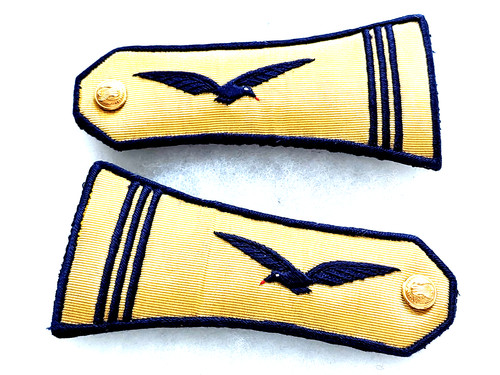 Une paire epaulettes de - une, d'epaulettes