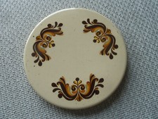 Un ancien protège plaque gazinière vintage