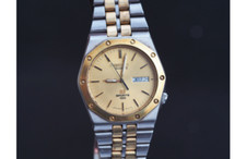 Montre SEIKO SQ Sport 100 Doré 