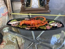 Plat en céramique de Vallauris à décor de poissons et crustacé