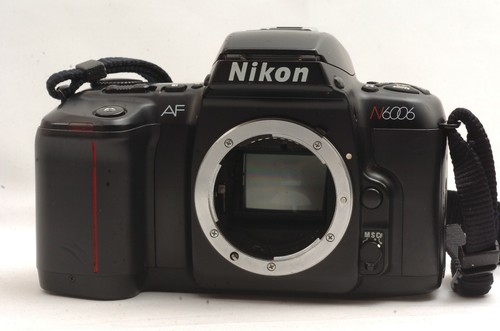 Appareil photo reflex - @,