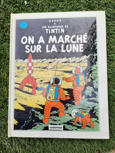 Tintin marche sur - tintin,