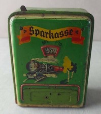 Ancienne tirelire en tôle