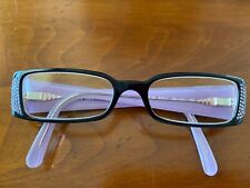 lunettes de vue femme Prada incrustées de pierre Swarosvski.