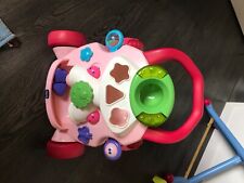 Trotteur bébé fille marque Chicco rose 