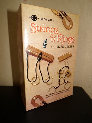 Casse tête bois - :, strings