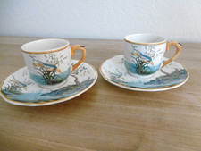 DEUX TASSES A CAFE FAIENCE GIEN DECOR CARAIBES OU MAGELLAN Lot 2.