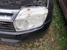 Optique avant principal gauche (feux)(phare) DACIA DUSTER 1 PHASE 1