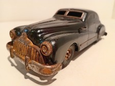 Gama Schuco 100 DE Buick Roadmaster noire mecanique tole tombe pas de table 1/24