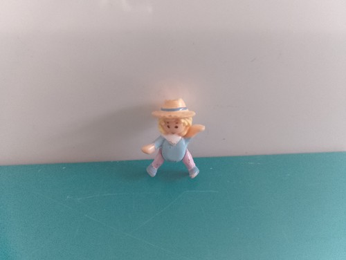 Polly pocket figurine doll