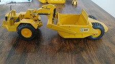 NZG scraper CATERPILLAR 1/50 BTP engin de chantier no box conrad joal gescha