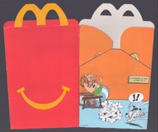 UDERZO . ASTÉRIX . BOITE HAPPY MEAL VIDE . PUB MAC DONALD'S . 2021 . ( CR )