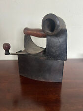 Fer à repasser en fonte et