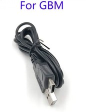 • Câble chargeur USB