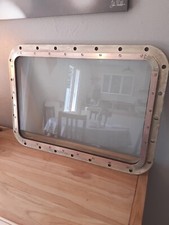 Hublot dormant ( bronze et laiton ) 70 x 51 cm