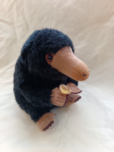 Peluche taupe nifler les - ,