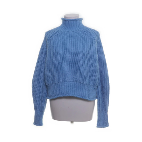 Pull col roulé - taille,