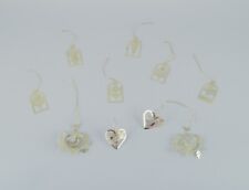 Royal Copenhagen "Royal Christmas". Lot de dix ornements de Noël en laiton.