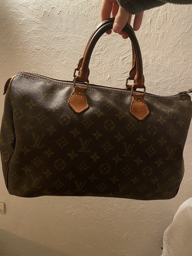 Sac main louis - main,