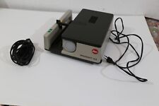 projecteur diapositives leitz pradovit 153 dans son emballage d'origine.