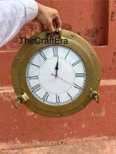 Horloge à hublot en laiton de
