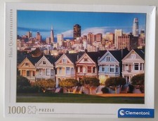 PUZZLE painted lady marque CLEMENTONI 1000 PIECES