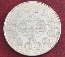 TRÉSOR DU PATRIMOINE   ??  Médaille ? 50 Ans du Nouveau Franc TBE