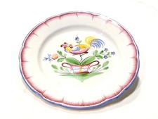 Assiette coq sur une patte