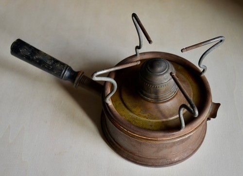 Ancien réchaud pétrole - à,