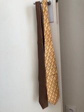 Deux cravates en soie - Etat correct- couleurs ocre/marron - 10 euros 