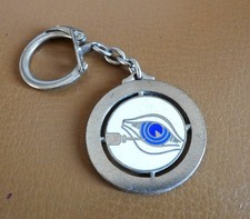 Ancien porte clé métal Oeil Yeux Soins Ophtamologie. Médecine. Collyre.