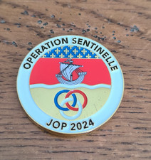 Insigne Coin Opération