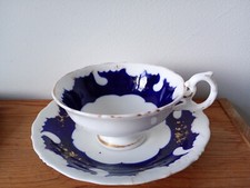 tasse à thé et soucoupe en porcelaine blanche /bleue /or numérotée.collection.