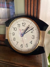 Pendule Japy, en formica noir et doré, années 50/60, déco vintage. France